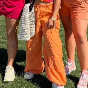UO Orange Parachute Pants